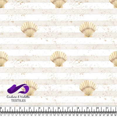 Seashell on a beige and white striped background with sand speckles