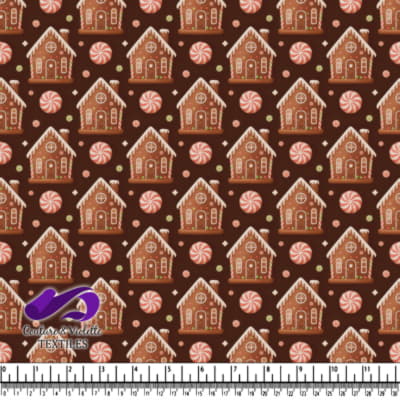 Gingerbread houses and peppermint candies on brown background