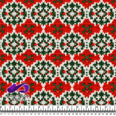 Red green and white knitted snowflake pattern textile