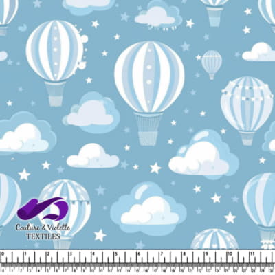 White hot air balloons floating among clouds and stars on a blue background