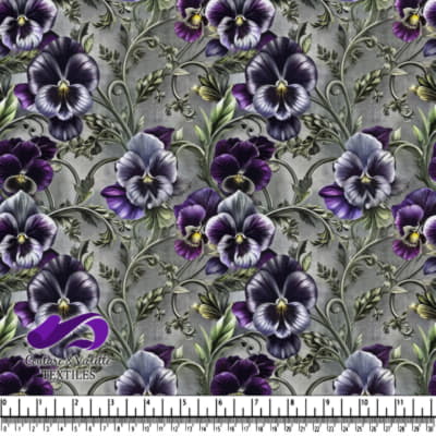 Vintage floral fabric with purple pansy flowers and green leaves