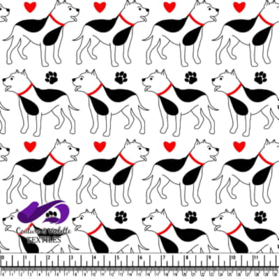 Black and white dogs with red collars and hearts