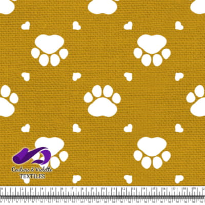 Cat - paws surround by littles hearts on golden yellow texture